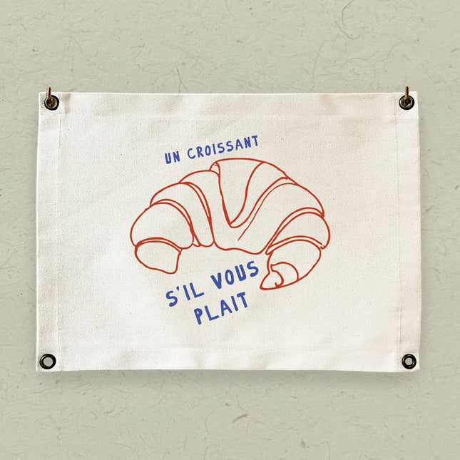 Un Croissant - Canvas & Grommet Wall Hanging